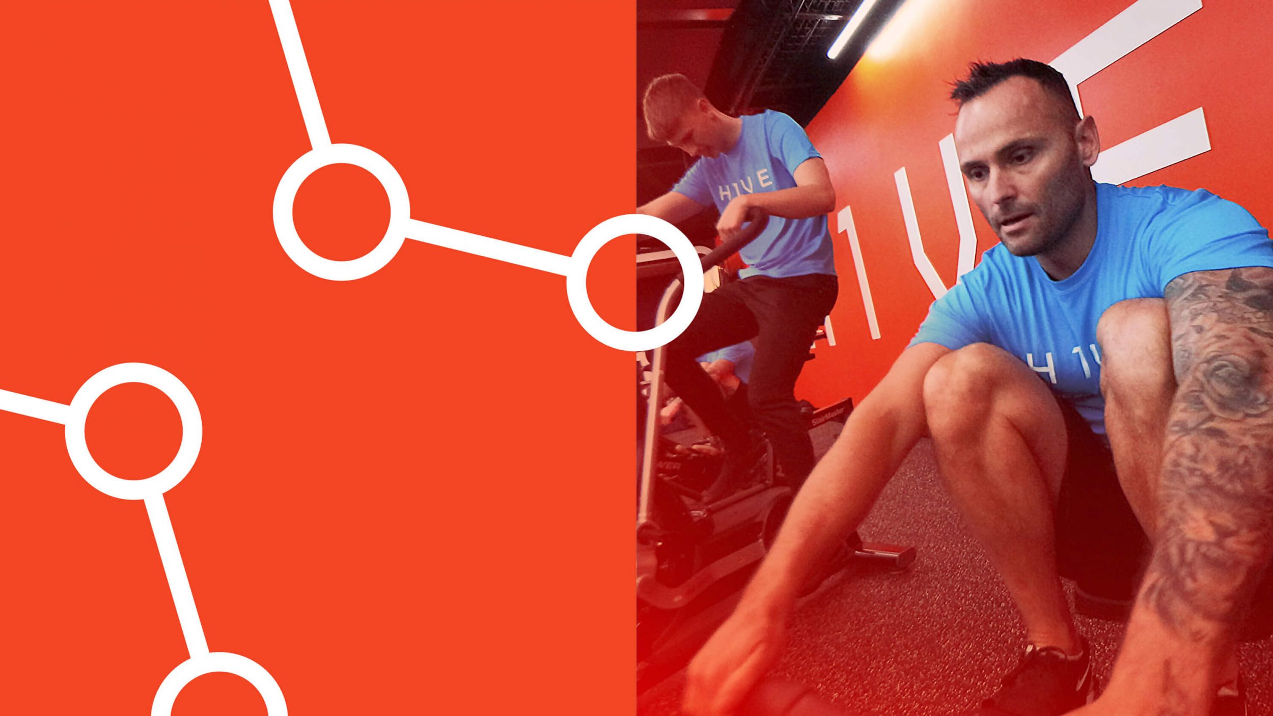 two white men in blue t-shirts. one is on the rowing maching, another on the exercise bike.