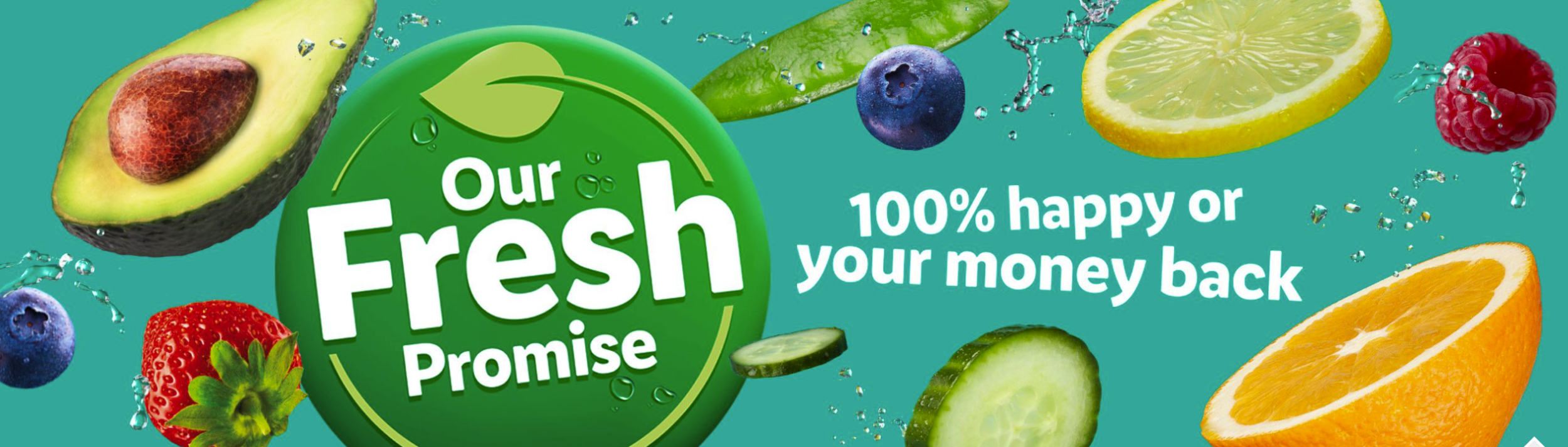 green banner ad with lots of fruit dotted around it and a green roundall saying Our Fresh promise, then as a subheading "100% happy or your money back"