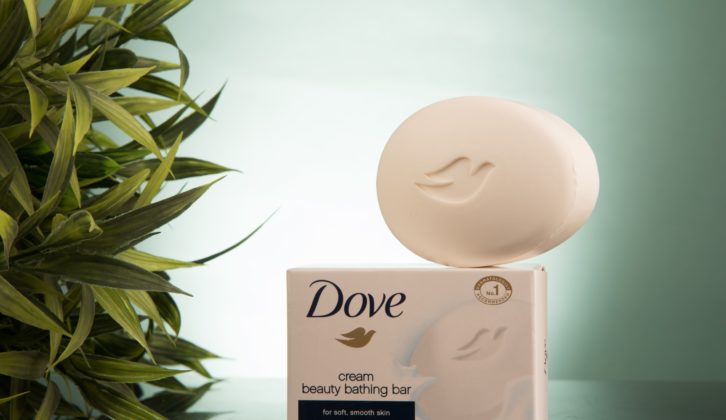 dove soap balances on top of packaging